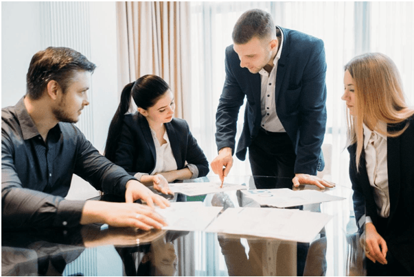 Business partners gathered around a table