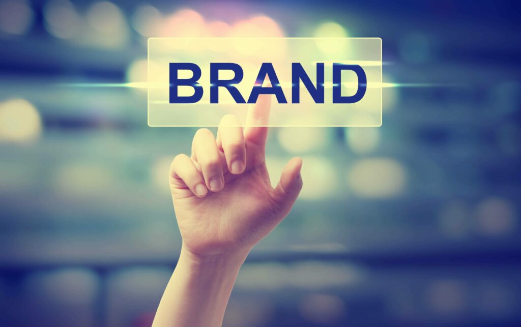 hand pointing at brand
