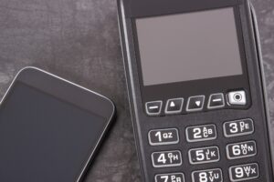 Credit card reader and mobile phone with NFC technology for cashless payment transaction