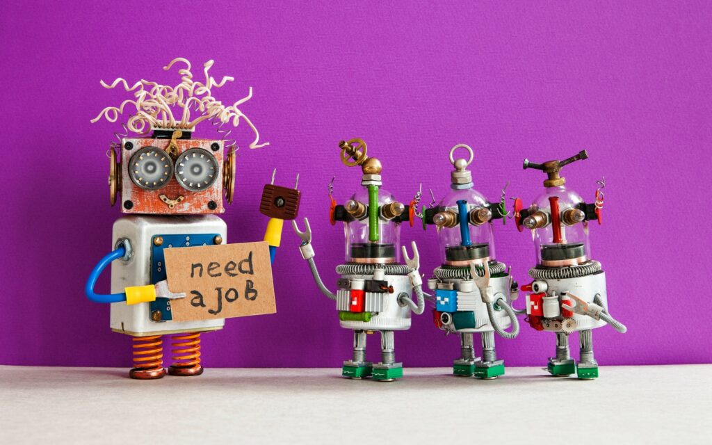 Job search concept. Robots looking for a job. Smiley unemployed robotic character with friends