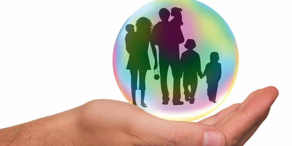 family on top of a hand