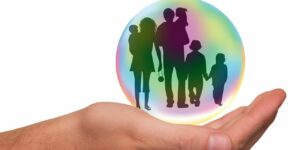 family on top of a hand