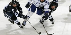 men playing ice hockey