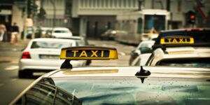 taxi auto road drive shield traffic taxi stand